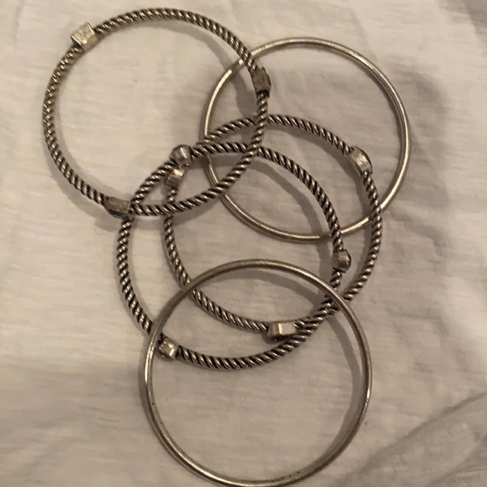 Silver bangle bracelet with some stones